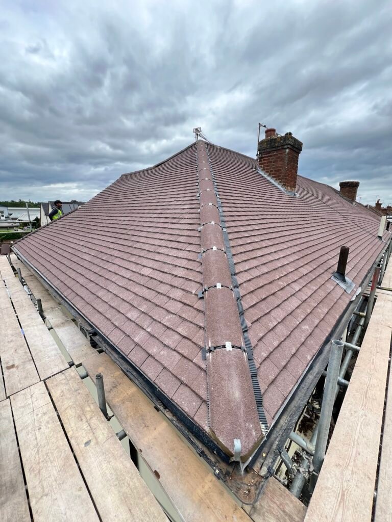 Brown tiled roof replacement by Aulakh Roofing