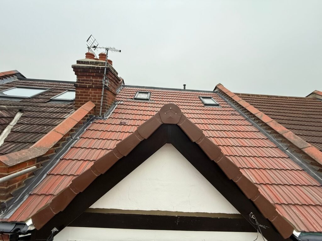Tiled gable roof with new bargeboard by Aulakh Roofing